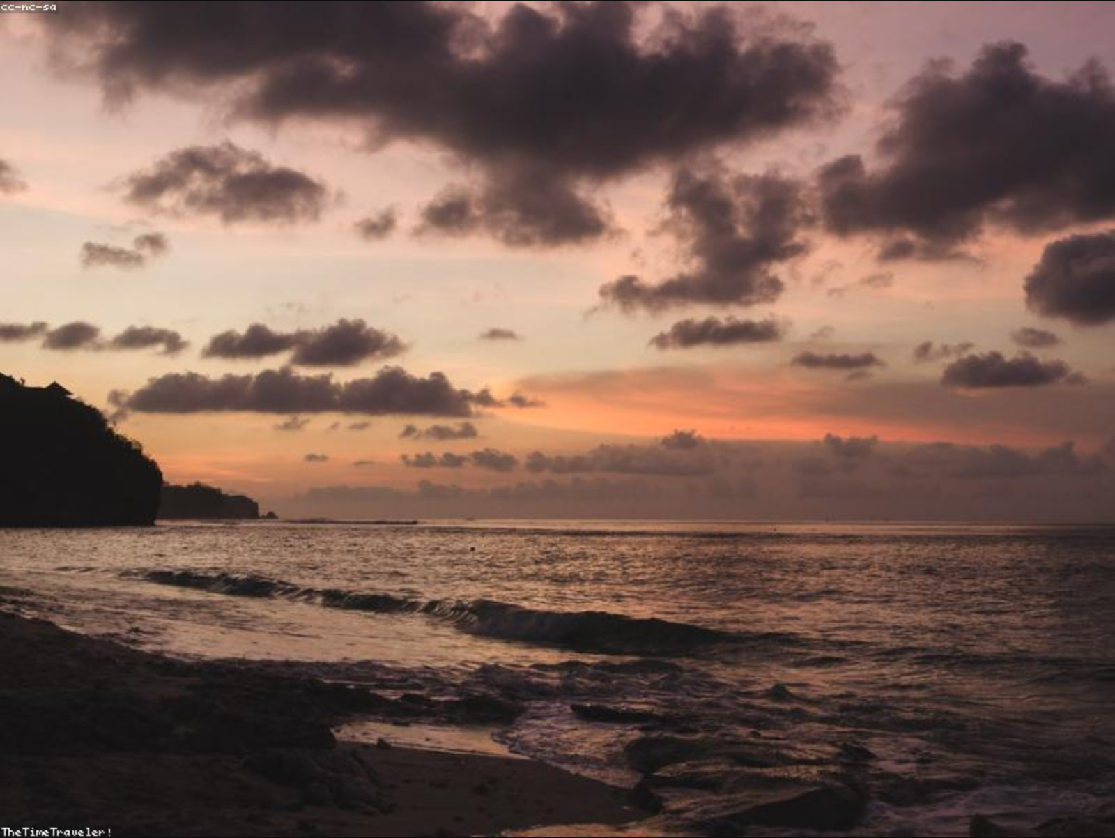 Bingin Beach shoreline at sunset